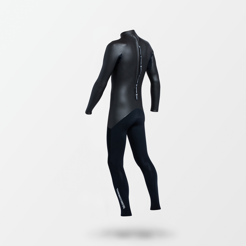 Japanese full suit wetsuit with Fahrenheit Celsius Wetsuits logo on the chest and a visible brand name, featuring a smooth rubber outer layer.