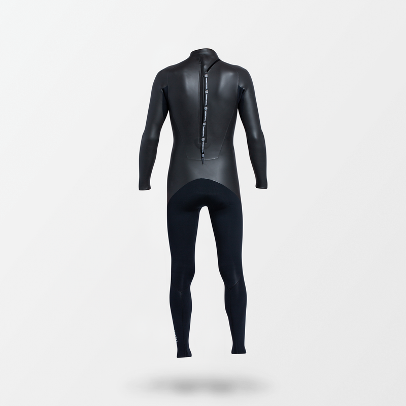 Japanese full suit wetsuit with Fahrenheit Celsius Wetsuits logo on the chest and a visible brand name, featuring a smooth rubber outer layer.