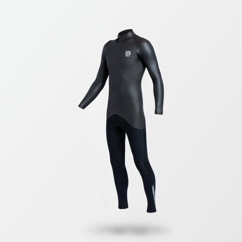Japanese full suit wetsuit with Fahrenheit Celsius Wetsuits logo on the chest and a visible brand name, featuring a smooth rubber outer layer.