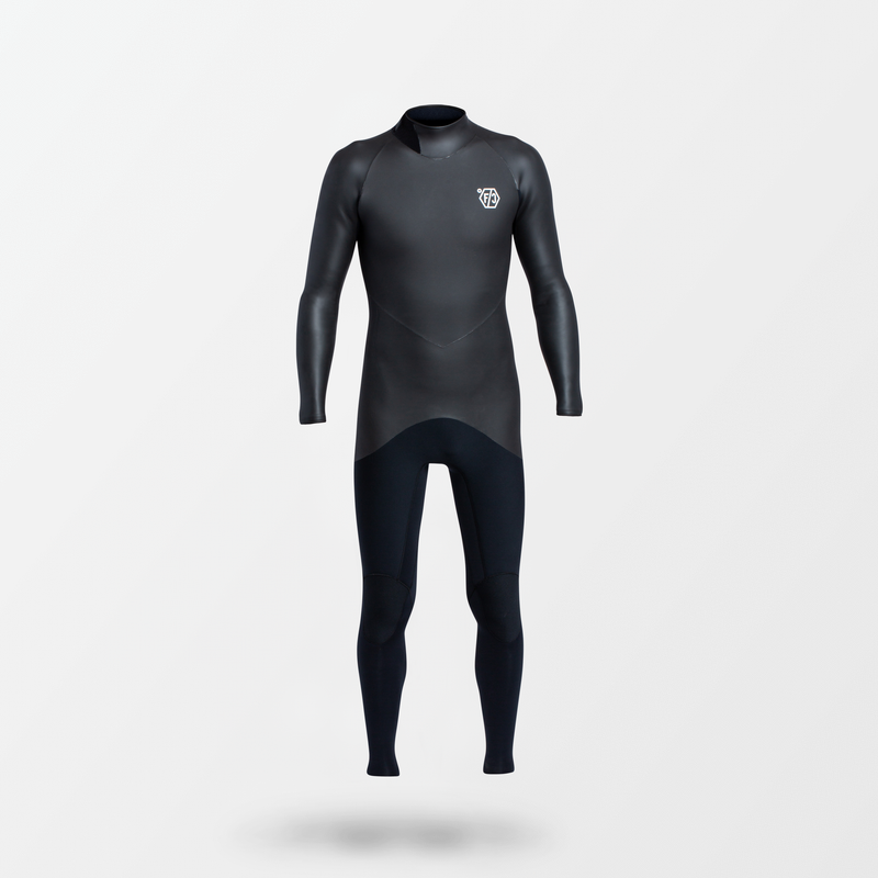 Japanese full suit wetsuit with Fahrenheit Celsius Wetsuits logo on the chest and a visible brand name, featuring a smooth rubber outer layer.