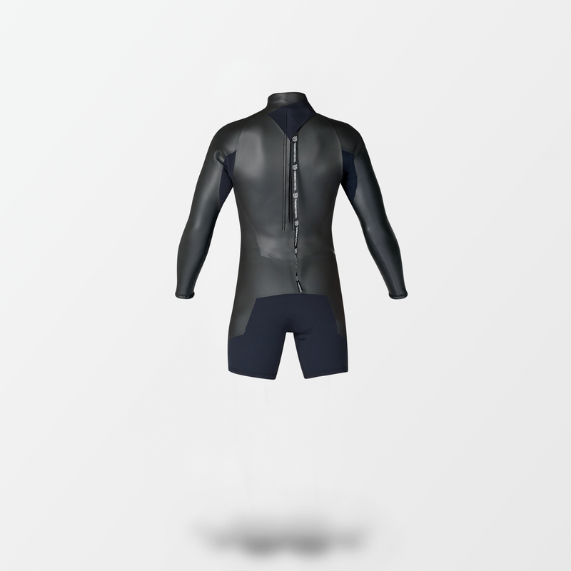 A black Japanese Spring wetsuit with Fahrenheit Celsius Wetsuits logo on the chest and a visible brand name, featuring a smooth 'rubber' outer layer.