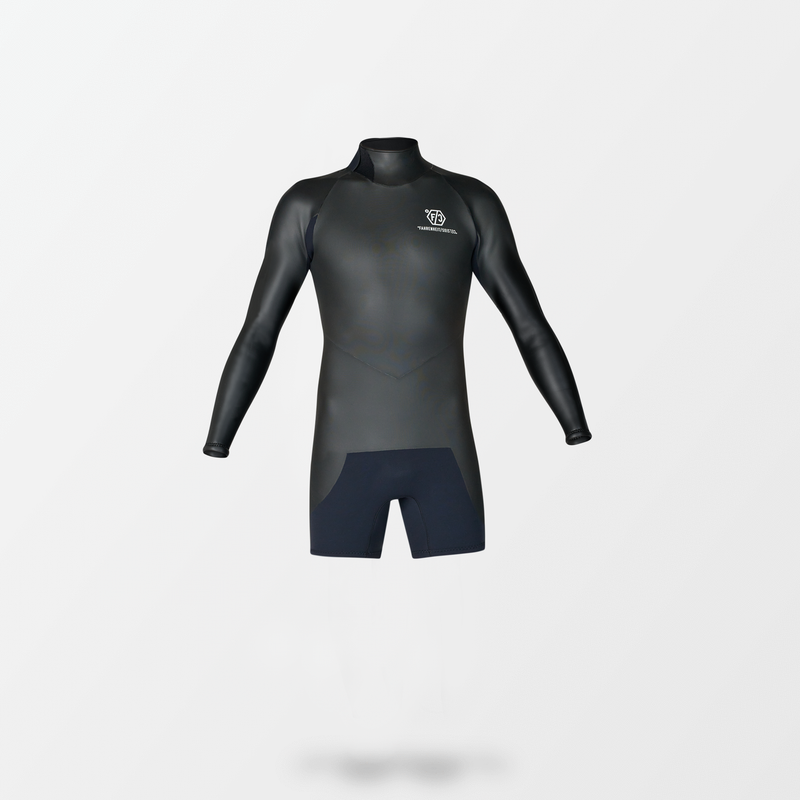 A black Japanese Spring wetsuit with Fahrenheit Celsius Wetsuits logo on the chest and a visible brand name, featuring a smooth 'rubber' outer layer.