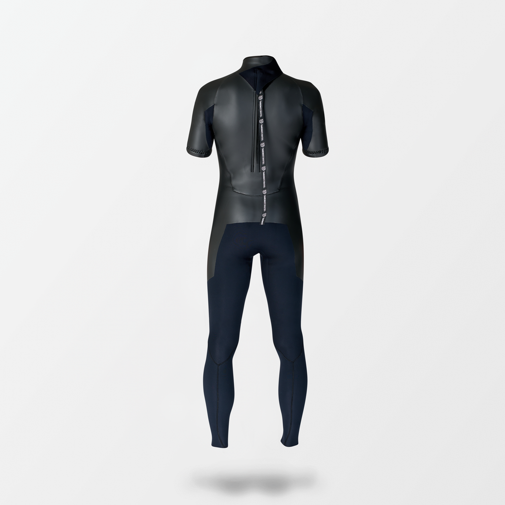 Japanese short sleeve full suit wetsuit with Fahrenheit Celsius Wetsuits logo on the chest and a visible brand name, featuring a smooth rubber outer layer.