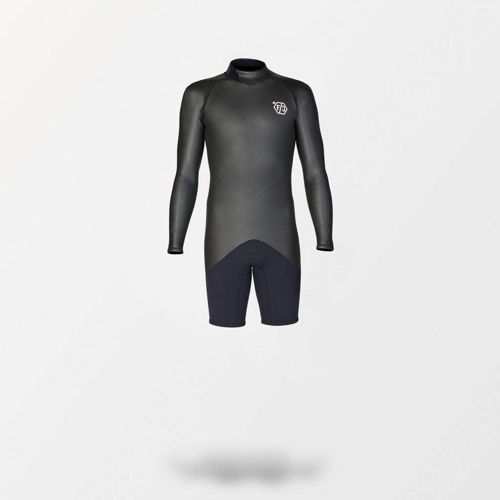 Japanese long sleeve spring wetsuit with Fahrenheit Celsius Wetsuits logo on the chest and a visible brand name, featuring a smooth rubber outer layer.
